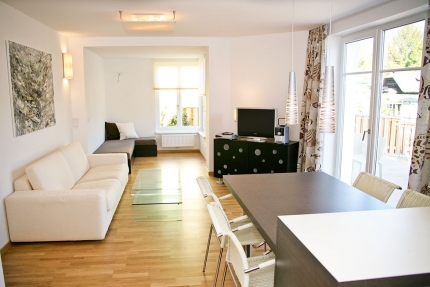 Seevilla Cattina – Wohnzimmer im Appartement Wasserstern – Luxus-Appartements direkt am Millstätter See in Kärnten
